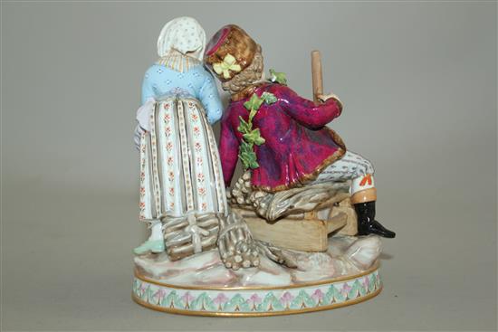 A Meissen group emblematic of winter, late 19th century, 14cm, some damage